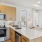 Well-lit kitchen with ample counter space