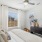Bedroom with natural lighting and high ceilings