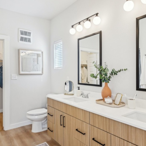 Spacious bathroom with ample lighting