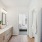 Spacious bathroom with ample lighting