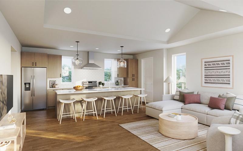 open concept living room and kitchen with counter seating