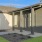 Large home porch with pillars and windows at Storybook Ranch